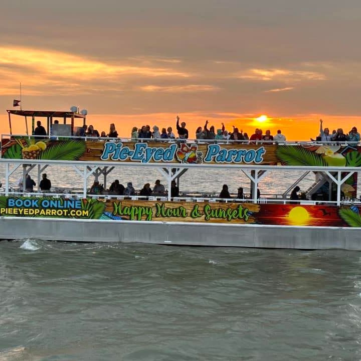 A painting of the sunset on top of a boat.