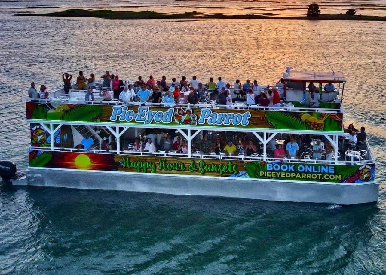 A boat full of people on the water.